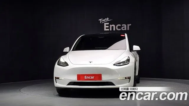 Tesla Model Y — Фото автомобиля 3
