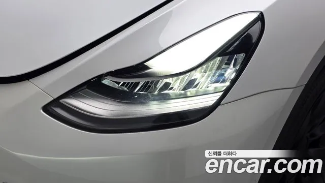 Tesla Model Y — Фото автомобиля 7