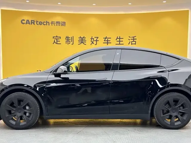 Tesla Model Y — Фото автомобиля 5