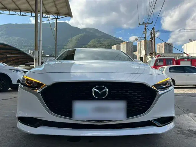 Mazda Axela — Фото автомобиля 11