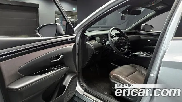 Hyundai Tucson Tucson (NX4) Бензин 1.6 Turbo 4WD — Фото автомобиля 11