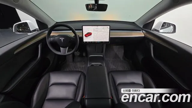 Tesla Model Y — Фото автомобиля 7
