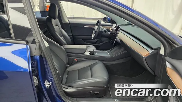Tesla Model 3 — Фото автомобиля 17