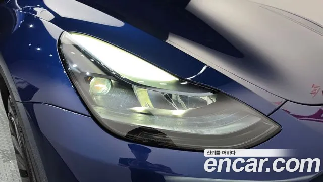 Tesla Model Y — Фото автомобиля 7