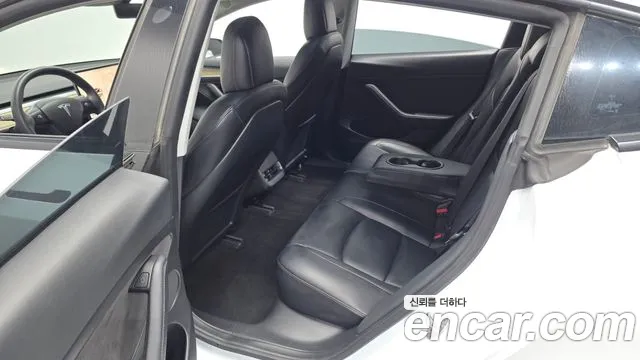 Tesla Model 3 — Фото автомобиля 18