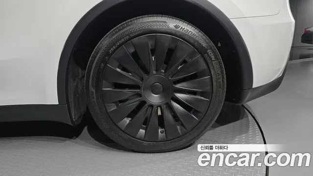 Tesla Model Y — Фото автомобиля 6