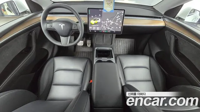 Tesla Model Y — Фото автомобиля 5