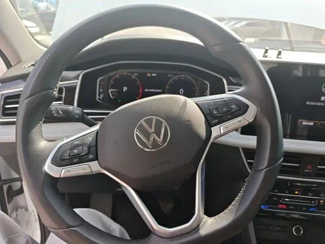 Volkswagen Tiguan L — Фото автомобиля 10