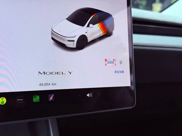 Tesla Model Y — Фото автомобиля 11