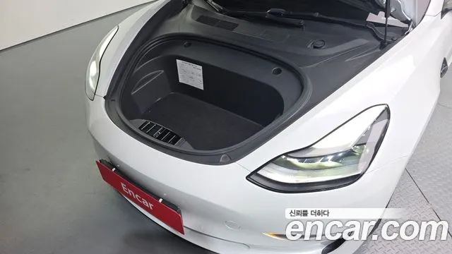 Tesla Model 3 — Фото автомобиля 6
