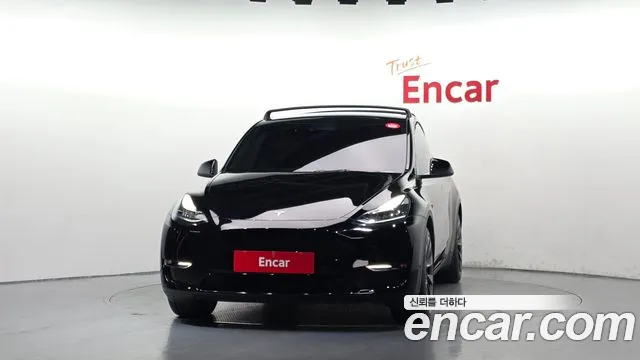 Tesla Model Y — Фото автомобиля 3