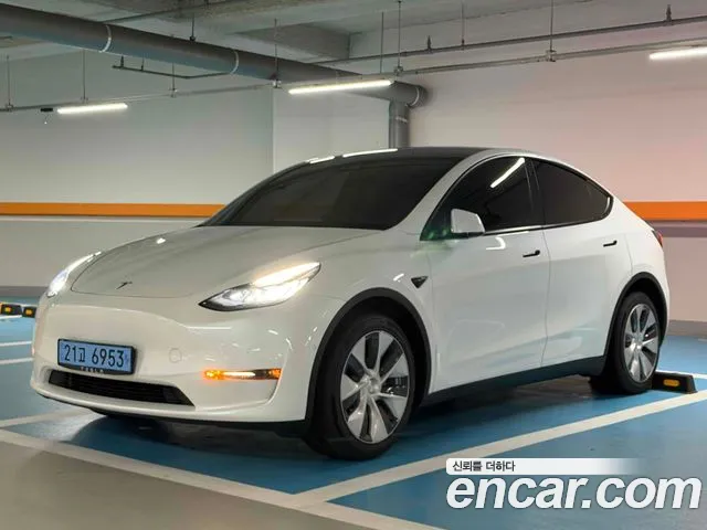 Tesla Model Y — Фото автомобиля 2