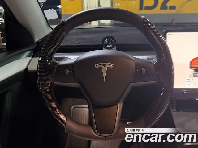 Tesla Model Y — Фото автомобиля 6