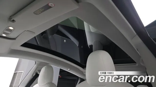 Tesla Model Y — Фото автомобиля 16