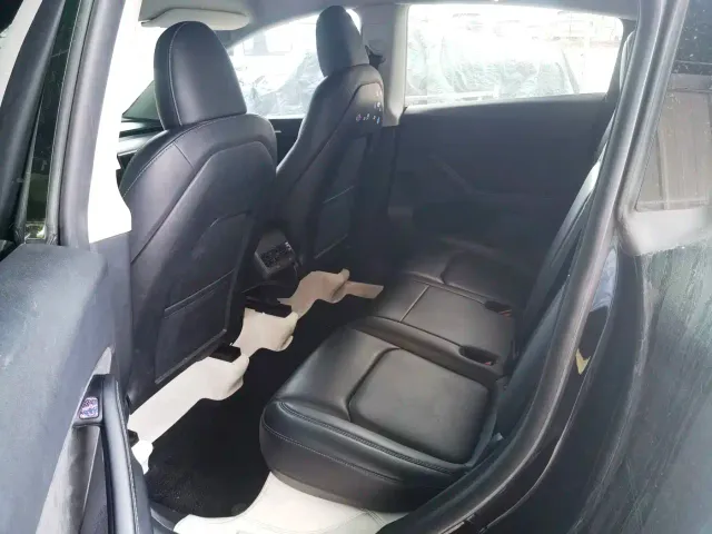 Tesla Model Y — Фото автомобиля 10
