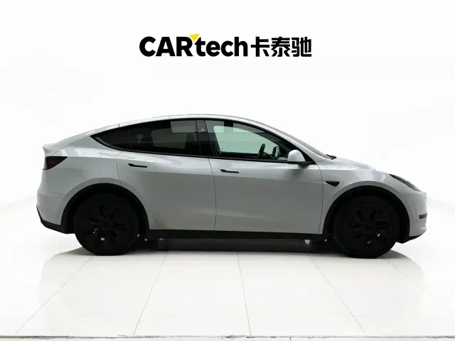 Tesla Model Y — Фото автомобиля 5
