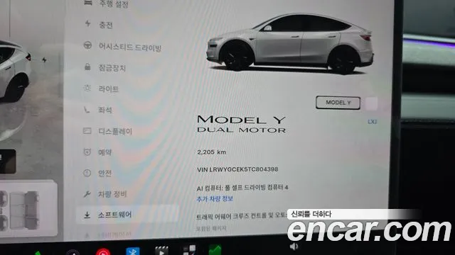 Tesla Model Y — Фото автомобиля 11