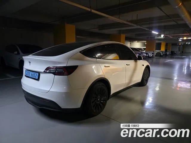 Tesla Model Y — Фото автомобиля 5