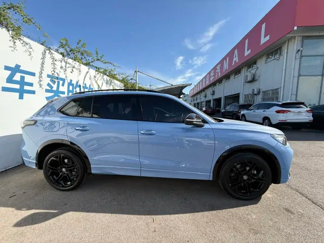 Volkswagen Tiguan L — Фото автомобиля 3