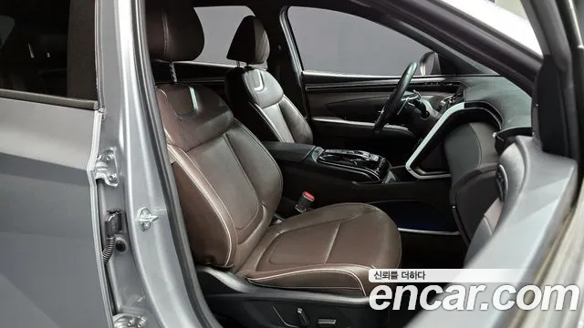 Hyundai Tucson Tucson (NX4) Бензин 1.6 Turbo 4WD — Фото автомобиля 10