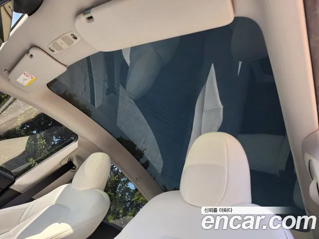 Tesla Model Y — Фото автомобиля 18