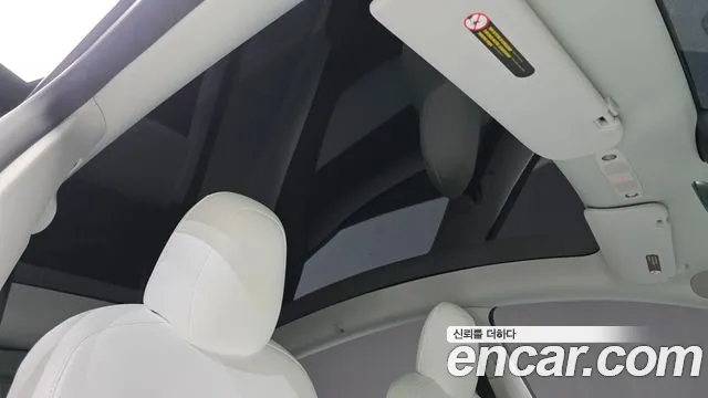 Tesla Model Y — Фото автомобиля 16