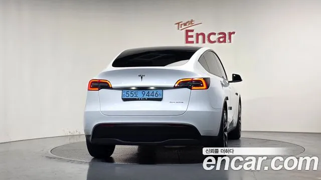 Tesla Model Y — Фото автомобиля 4