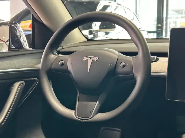 Tesla Model Y — Фото автомобиля 22