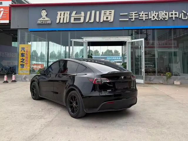 Tesla Model Y — Фото автомобиля 7