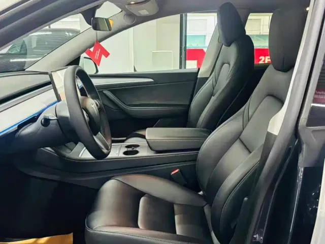 Tesla Model Y — Фото автомобиля 7