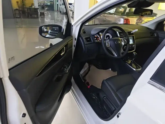 Nissan Tiida — Фото автомобиля 15