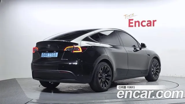 Tesla Model Y — Фото автомобиля 2