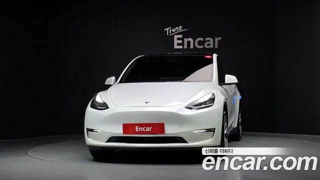 Tesla Model Y — Фото автомобиля 3