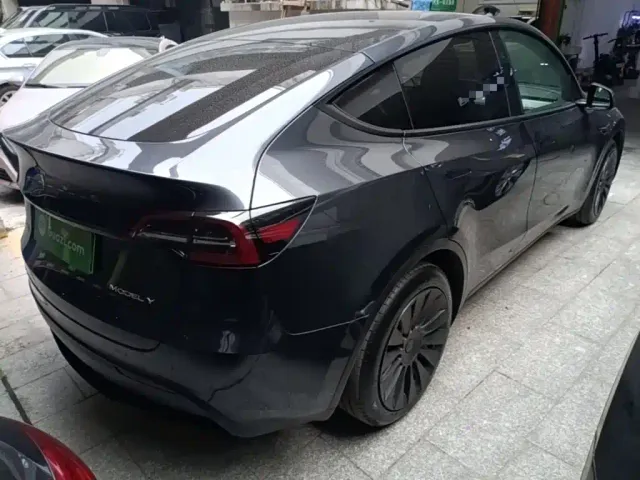 Tesla Model Y — Фото автомобиля 6