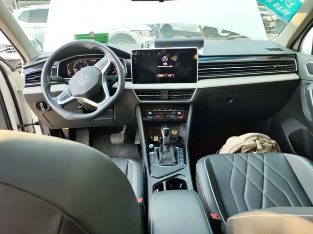 Volkswagen Tiguan L — Фото автомобиля 5