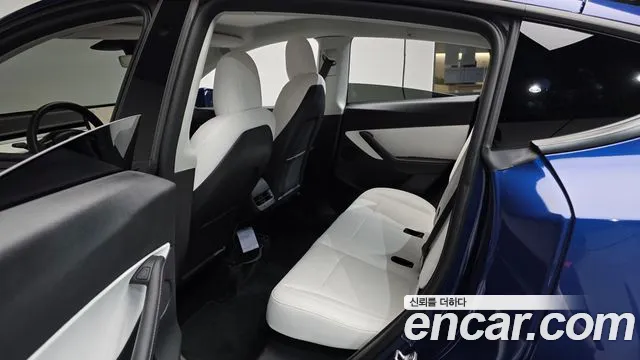 Tesla Model Y — Фото автомобиля 25