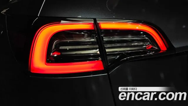 Tesla Model Y — Фото автомобиля 8