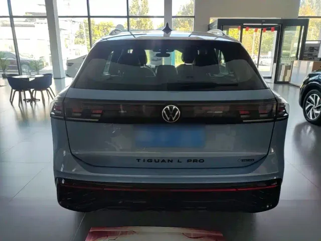 Volkswagen Tiguan L — Фото автомобиля 5