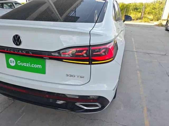 Volkswagen Tiguan X — Фото автомобиля 7