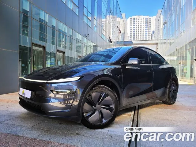 Tesla Model Y — Фото автомобиля 2