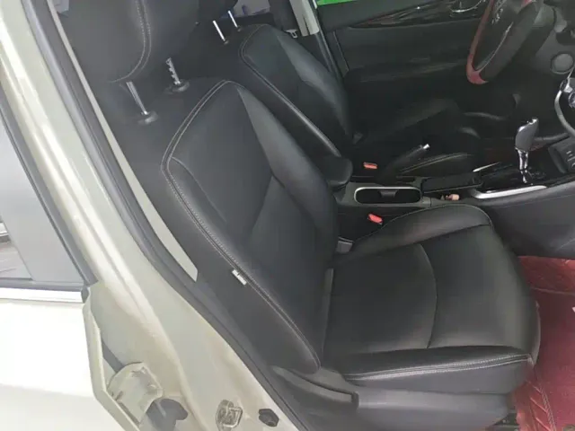Nissan Tiida — Фото автомобиля 24