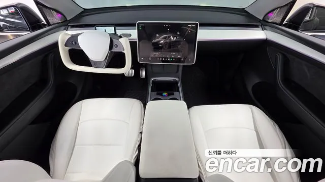 Tesla Model Y — Фото автомобиля 7