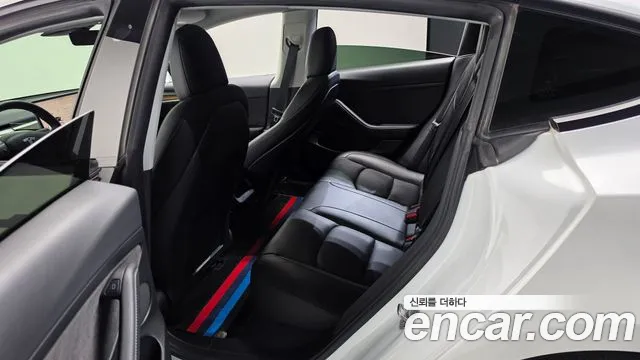 Tesla Model 3 — Фото автомобиля 11