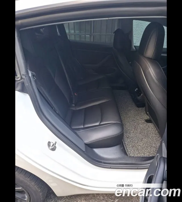 Tesla Model 3 — Фото автомобиля 7