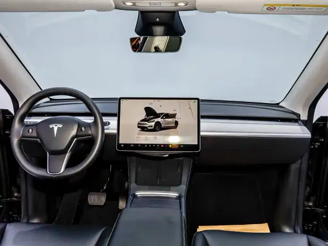 Tesla Model Y — Фото автомобиля 27