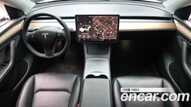 Tesla Model Y — Фото автомобиля 7