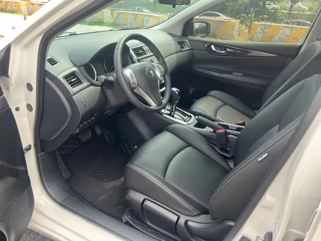 Nissan Tiida — Фото автомобиля 13