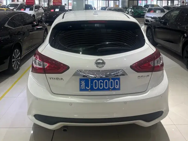 Nissan Tiida — Фото автомобиля 13