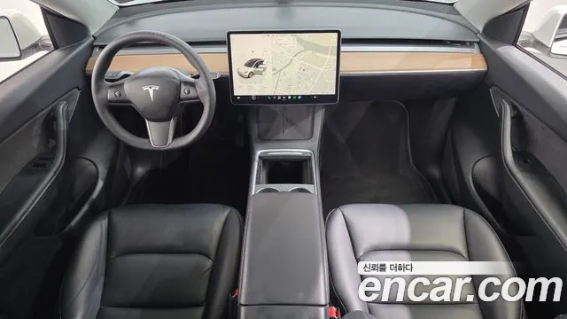 Tesla Model Y — Фото автомобиля 7