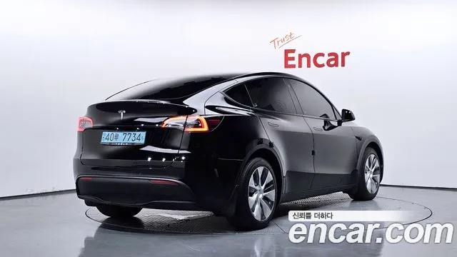 Tesla Model Y — Фото автомобиля 2